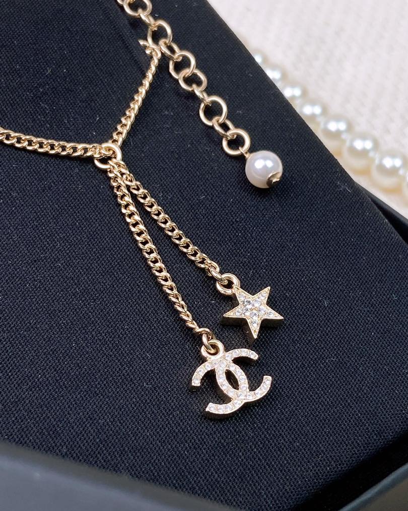 Chanel 23A Light Gold Dangling Star Logo Necklace