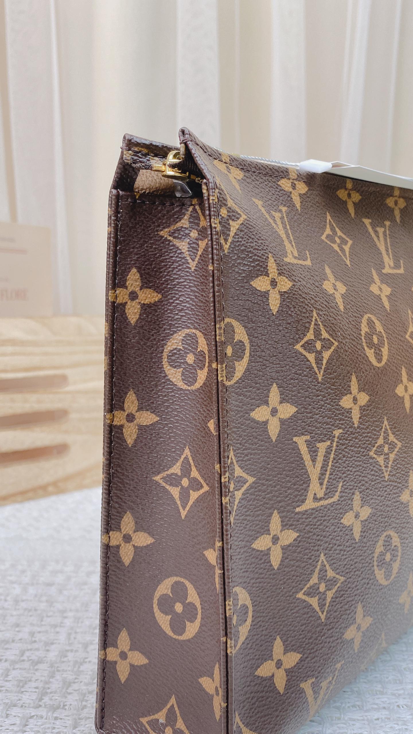 LV Monogram Toiletry 26