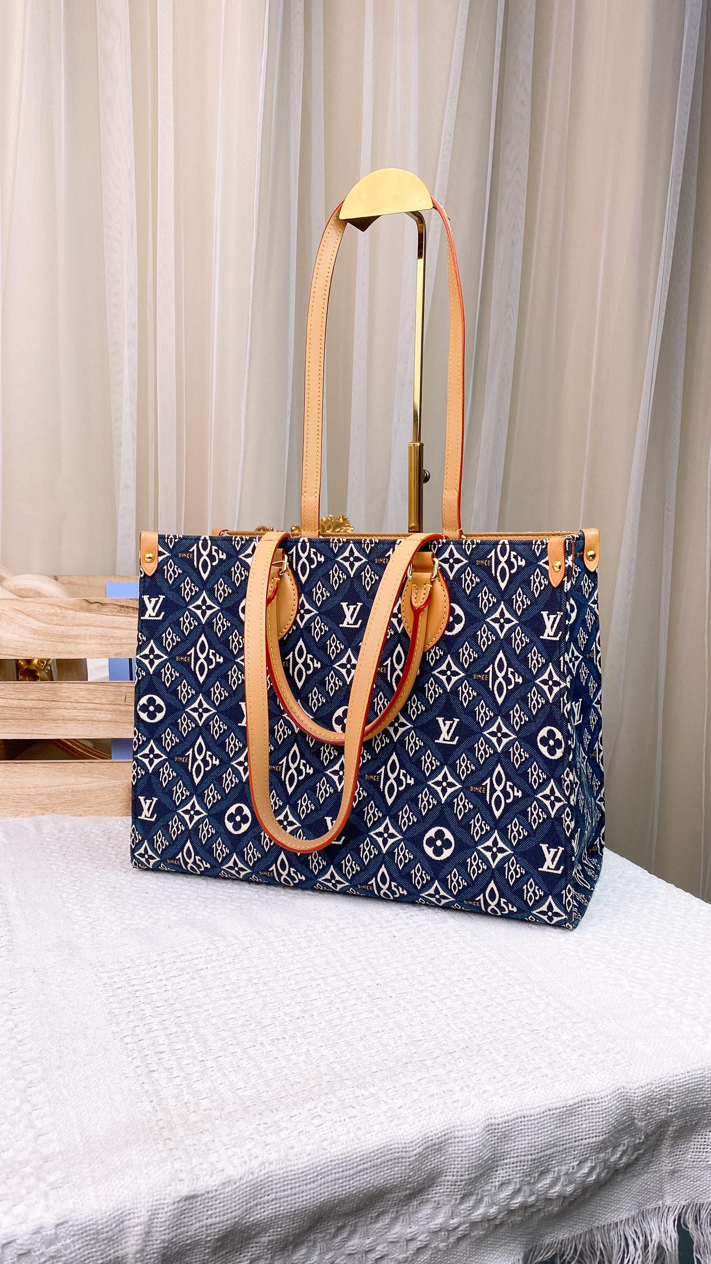 LV Since 1854 On The Go MM