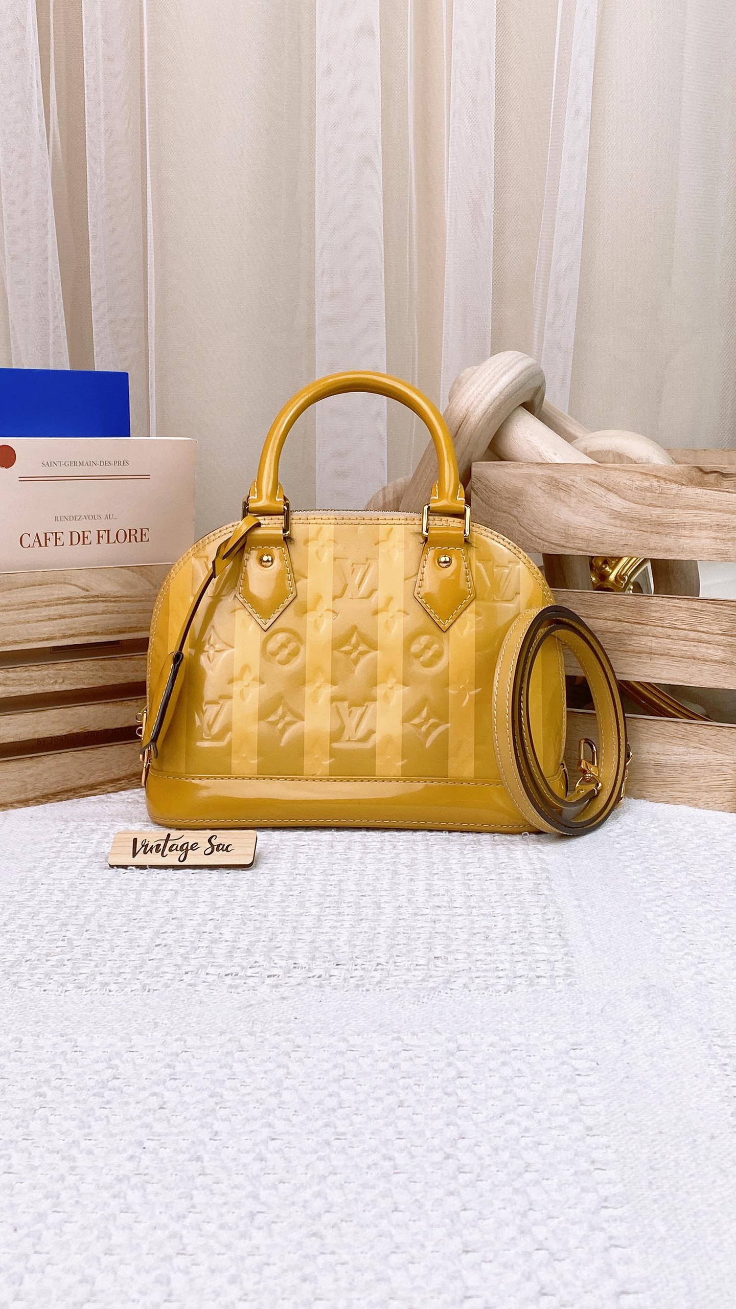 LV Yellow Vernis Rayures Alma BB