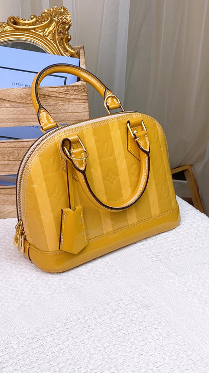 LV Yellow Vernis Rayures Alma BB