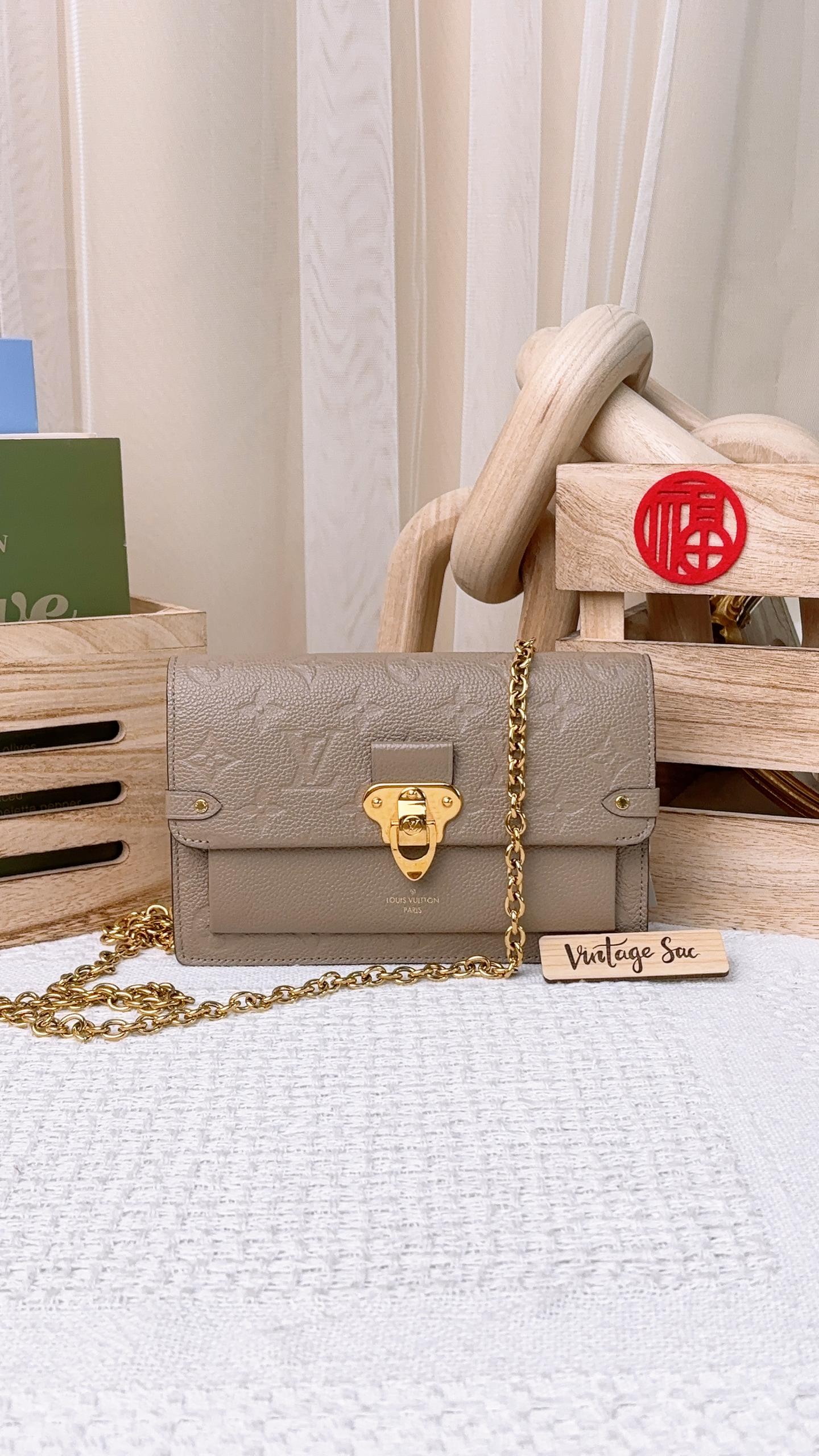 LV Tourterelle Empreinte Vavin Chain Wallet